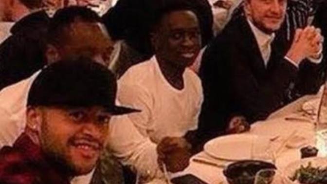 Why is it disrespectful to wear a hat at the dinner table?