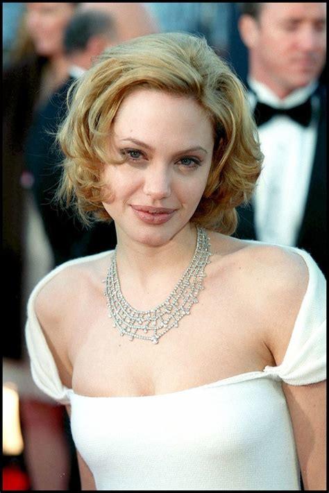 Who looks prettier or better as a blonde - Jessica Alba or Angelina Jolie?