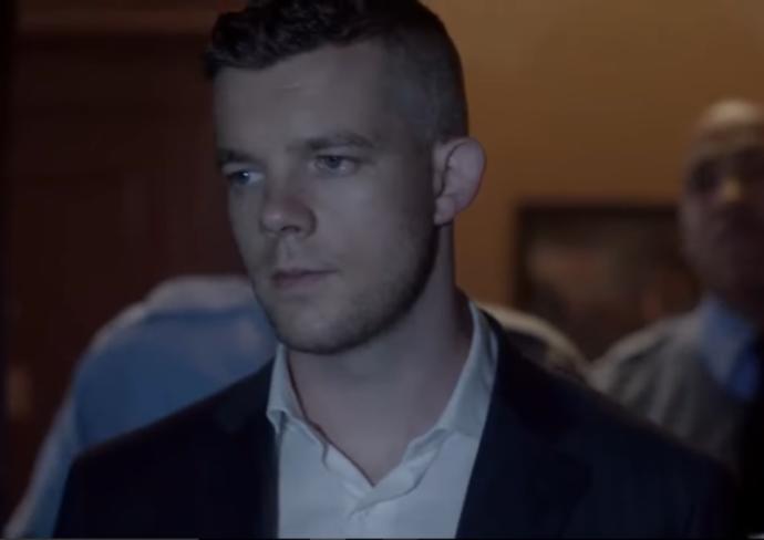 Why do guys look hot wearing a suit without a tie?