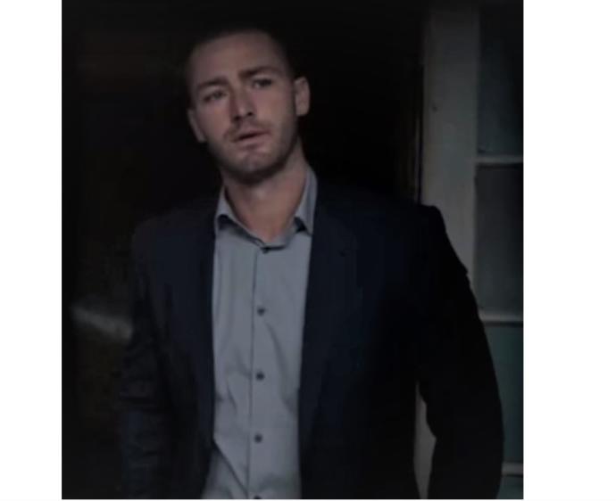 Why do guys look hot wearing a suit without a tie?
