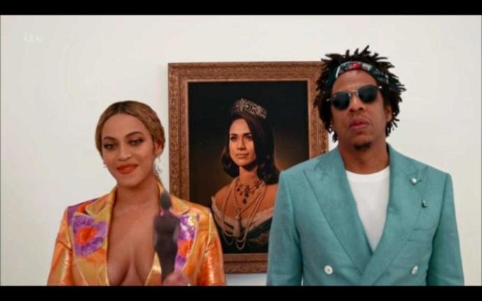 Jay z and Beyoncé accept Brit award in front of Meghan Markle portrait. Thoughts?
