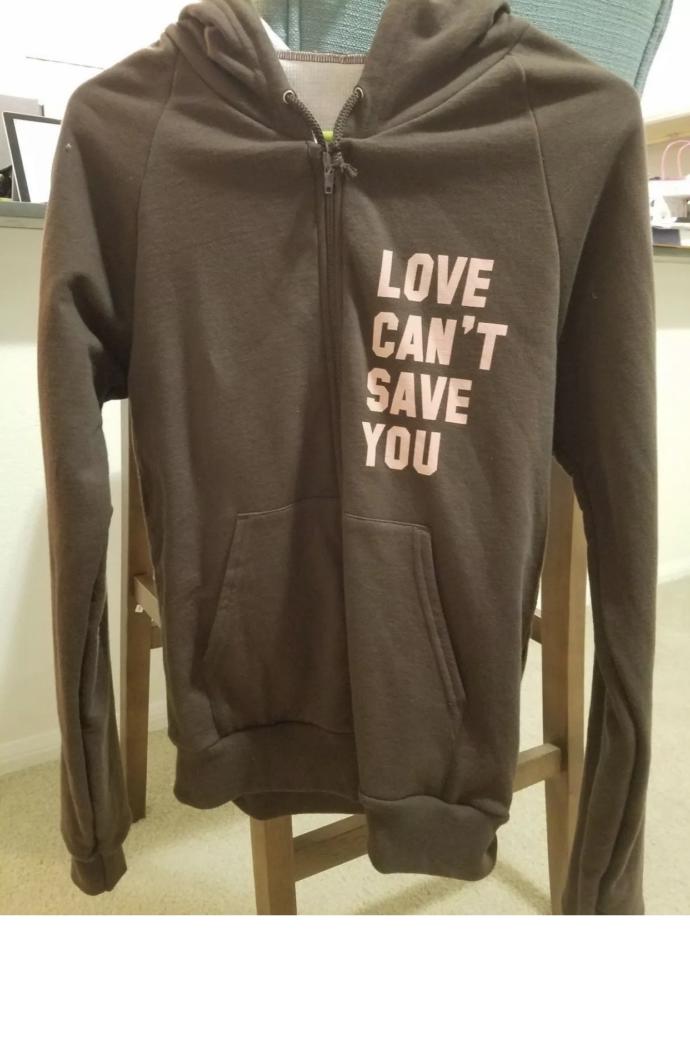 Donyou like this brown jaclet with the quote “love can't save you - only my new powers can “ ?