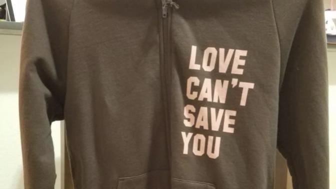 Donyou like this brown jaclet with the quote “love can't save you - only my new powers can “ ?