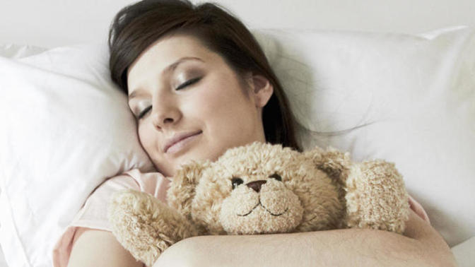 Is it wrong for a 22 year old to still sleep with a stuffed animal?