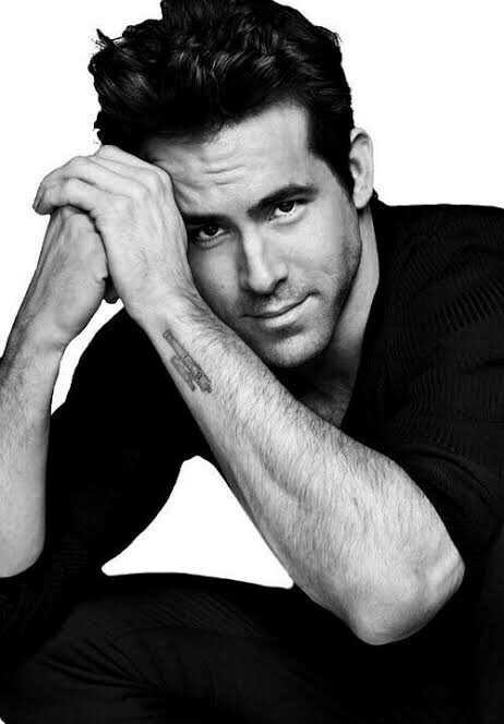 Who's more attractive: Brad Pitt or Ryan Reynolds?