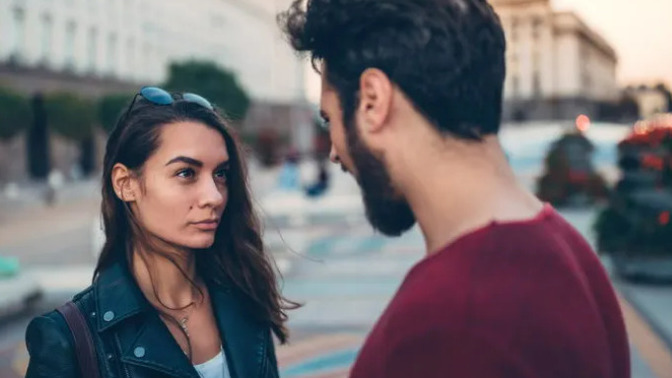 What does it mean when a girl stares at you but doesn't smile?