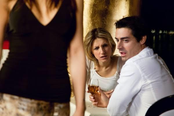 Girls, Women... Do you feel threatened or sad (or anything negative) when you catch your SO checking out other women?