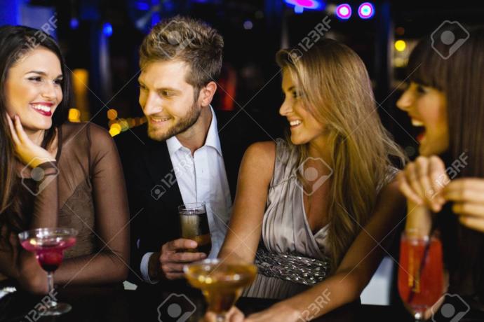 Should the girl make move or the guy when talking to a group?