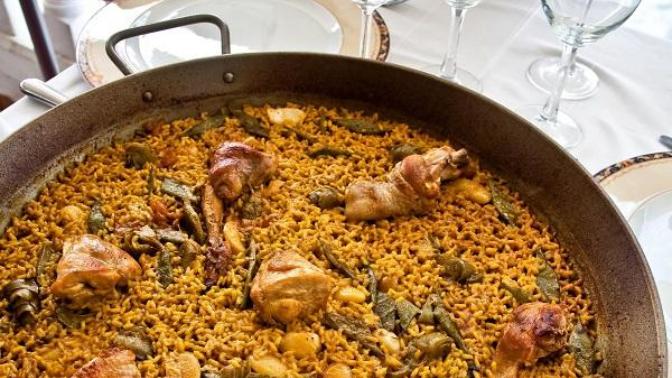 Spanish food: what do you rather give a taste, original paella or arroz negro?