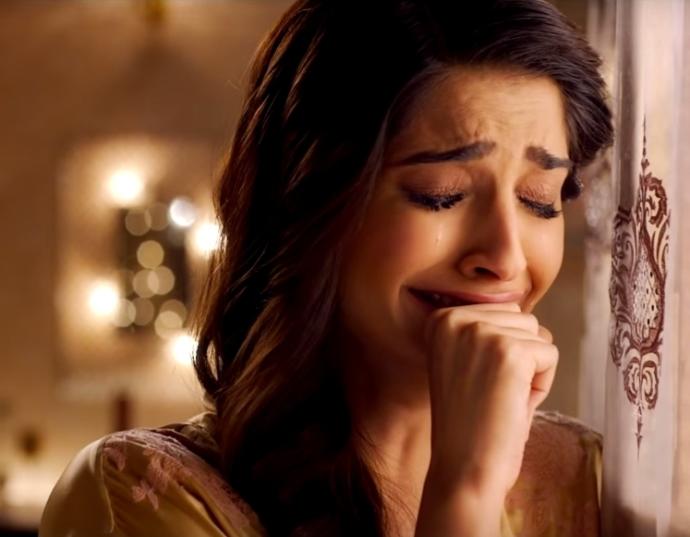 A man/woman breaks down crying right next to you. What would you do?