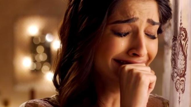A man/woman breaks down crying right next to you. What would you do?