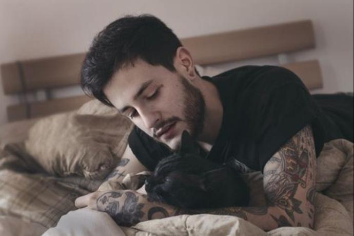 Ladies, would you mind if your guy took time out of his day to spend time with his cat?