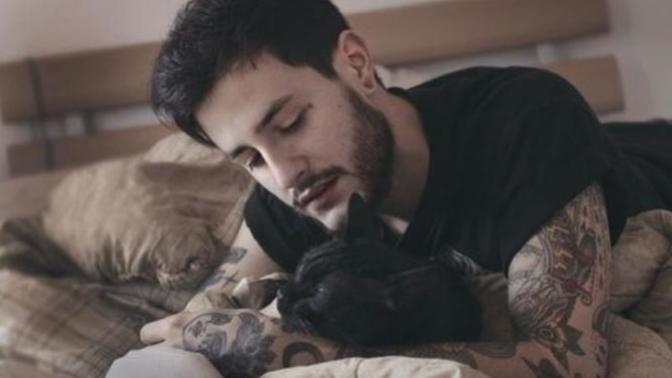 Ladies, would you mind if your guy took time out of his day to spend time with his cat?