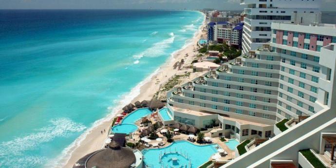 Would you rather travel to Cancun Or New York??