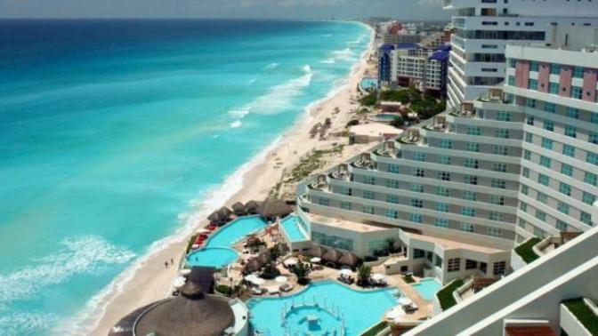 Would you rather travel to Cancun Or New York?