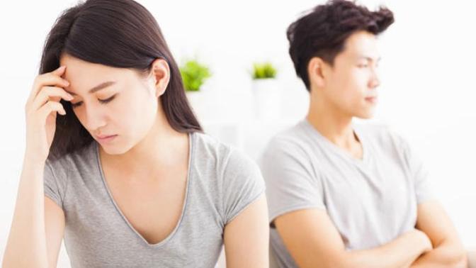How do I deal with a girlfriend who gets saddened frequently at my past?