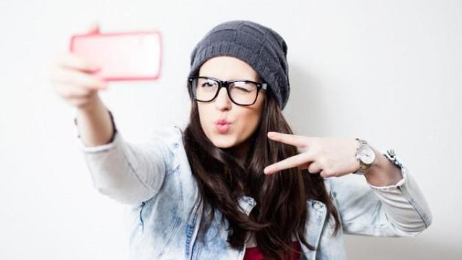 Why do guys ask for selfies over text? Could this mean he likes me?