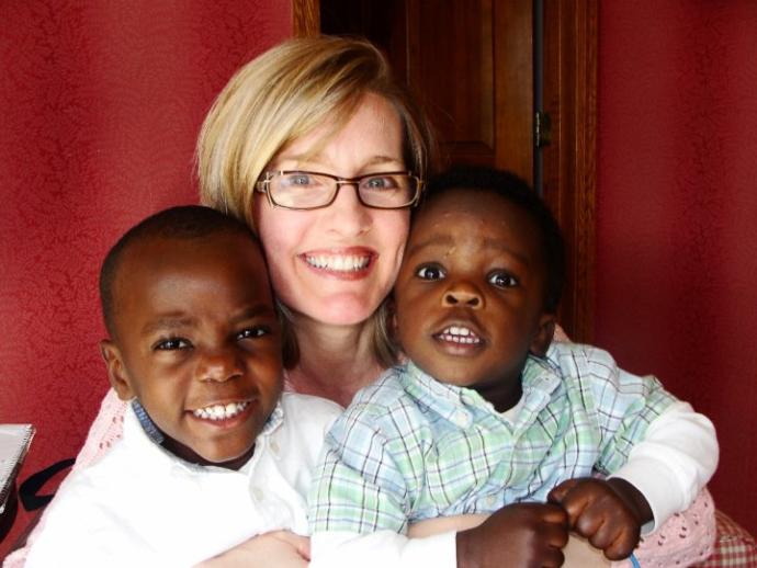 Why do some have problems with interracial adoption?