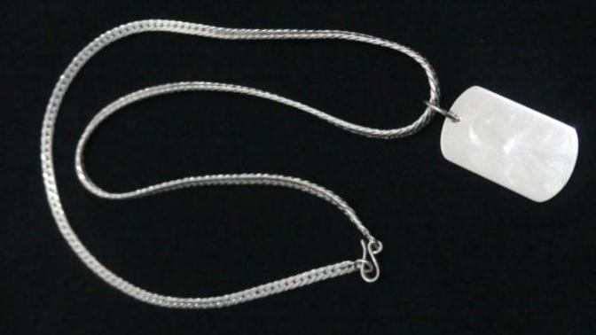 Please help me out! I bought a sterling silver necklace as a gift for my boyfriend. Is it a bad gift or do you think he will appreciate it (pic)?