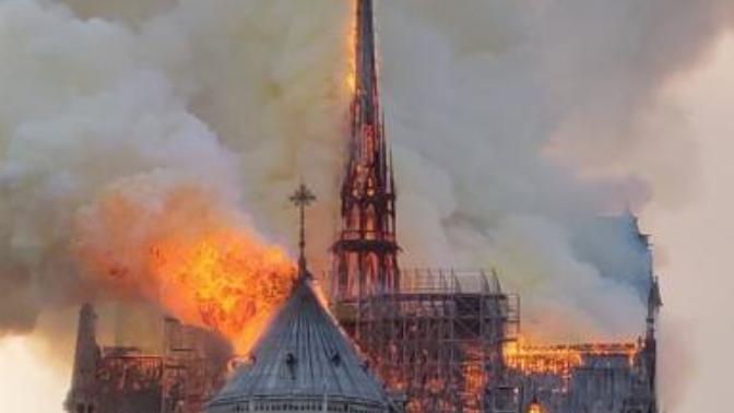 The Notre Dame in Paris is lit on fire guys, the whole building is going down, thoughts?