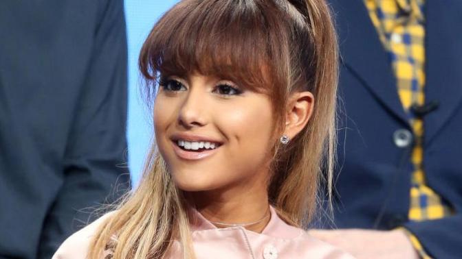 How old does Ariana grande look?