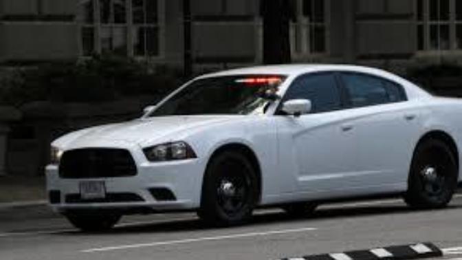 Stop for an unmarked cruiser or keep going?