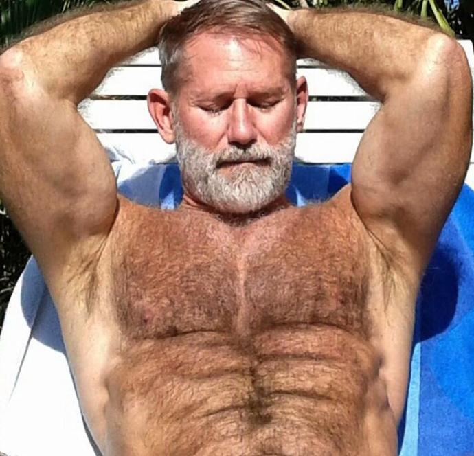 Visible upper chest hair?