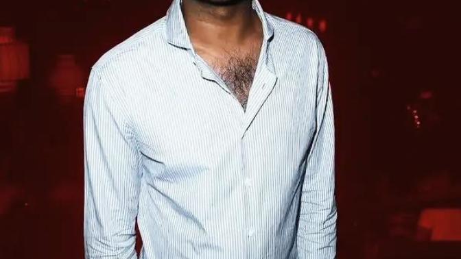 Visible upper chest hair?