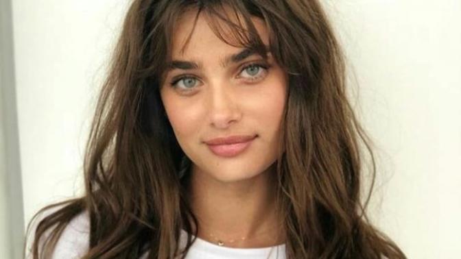 Which woman do you think is the prettiest or best looking - Charlize Theron, Taylor Hill or Lana Lokteff?