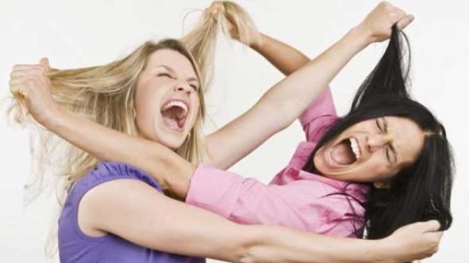 Girls, Have you ever been in a cat fight, or have you ever had another girl slap, or attack you, because she thought you were trying to take her guy?