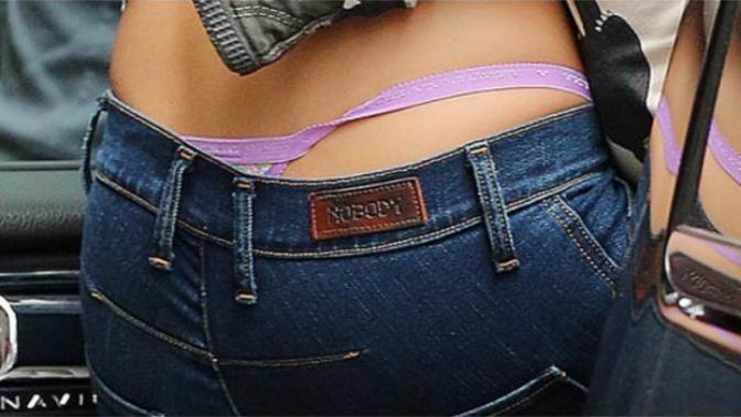 Guys, When you see a girls underwear poking out above her jeans/trousers do you assume she is showing it on purpose?