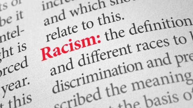 Is it racist to say the "N-Word" when singing the lyrics to a song?