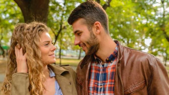 What should I do: he has a girlfriend, but texts me every day and asked me out?