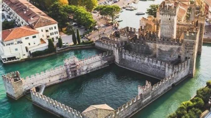 Would you like to visit Lake Garda and see Scaligero Castle in Northern Italy?
