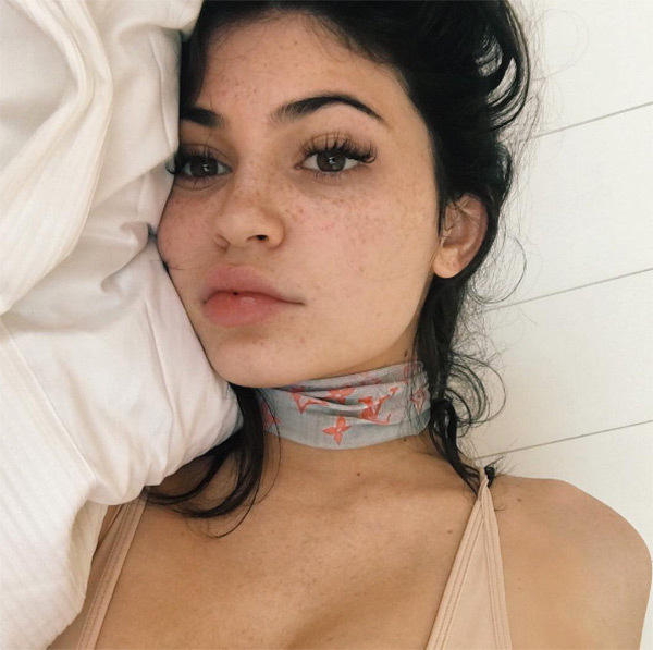 Why do some people hide their freckles with make up?