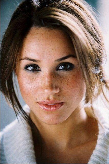 Why do some people hide their freckles with make up?