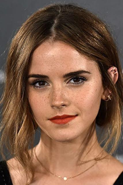 Why do some people hide their freckles with make up?