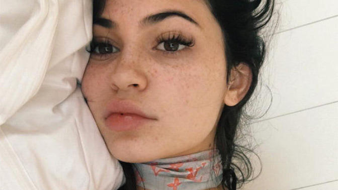 Why do some people hide their freckles with make up?