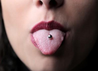Should I wear my tongue piercing to a restaurant interview?