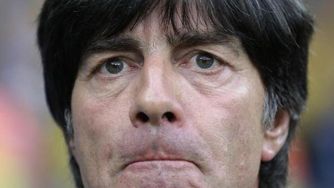 What is joachim löw's eye color?