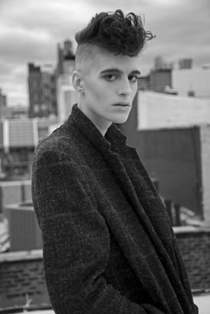 This is a cis-woman modelling for male clothing