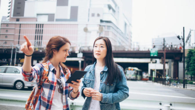 How do people travel the world despite the language barrier?