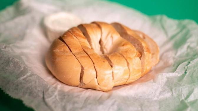 How should a bagel be cut?