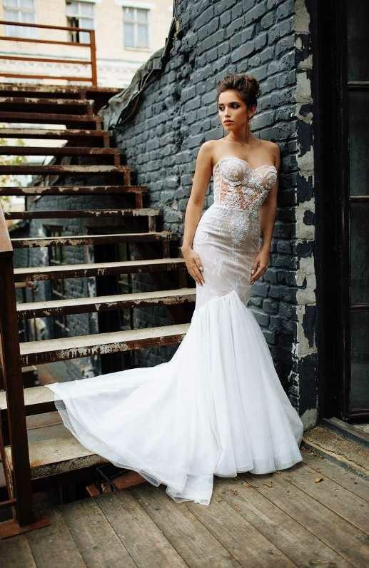 Guys, would you prefer your wife to wear a modest wedding dress on your wedding day, or one that shows everything for everyone to see??