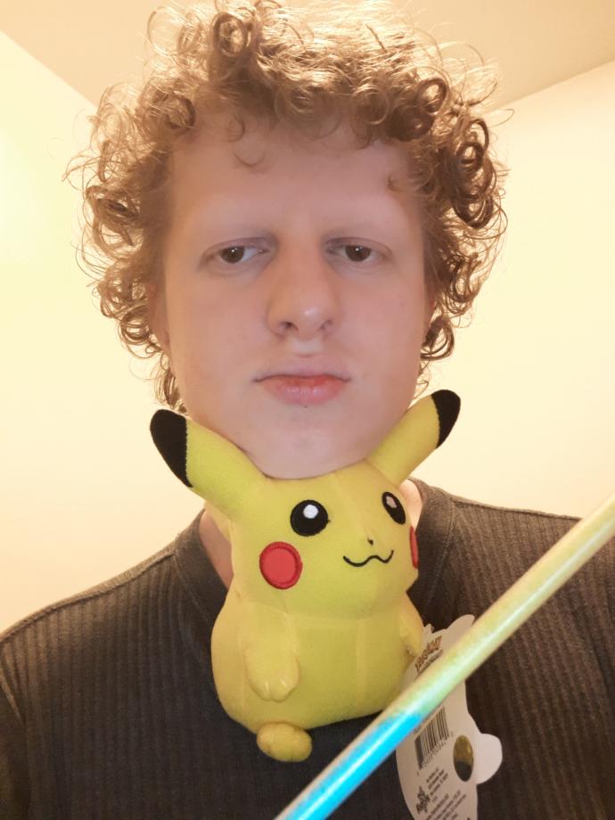 Have you ever ate a Fred Flintstone pixie stick while sitting next to a Pikachu doll?