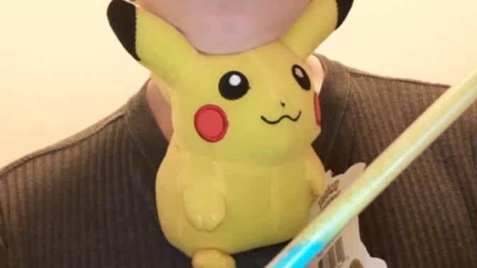 Have you ever ate a Fred Flintstone pixie stick while sitting next to a Pikachu doll?