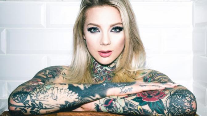 Is it unusual to see a women with a full sleeve tattoo?