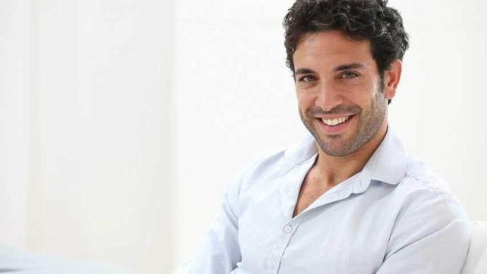 Is it true that men who don't smile are more attractive?