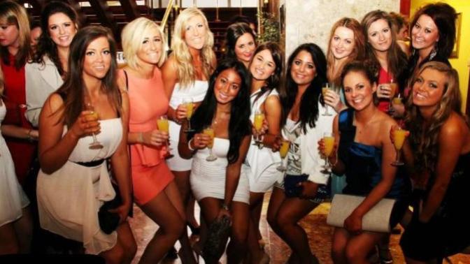 Why do women where heels that make them 4-6 inches taller, then crouch in photographs?
