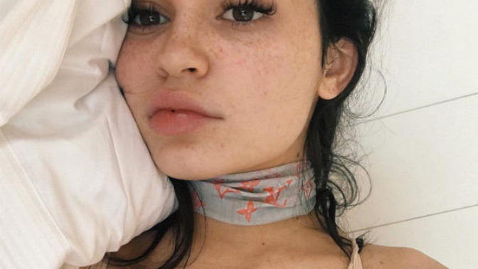 Guys: Is it more attractive for a girl to post a non makeup selfie in bed or one with makeup and a cute outfit?